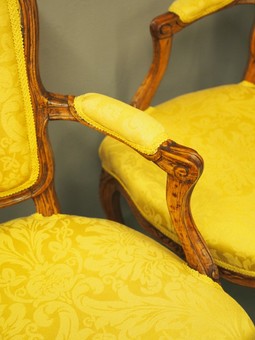 Antique Pair of French Louis XV Style Walnut and Beech Armchairs