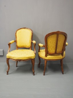Antique Pair of French Louis XV Style Walnut and Beech Armchairs