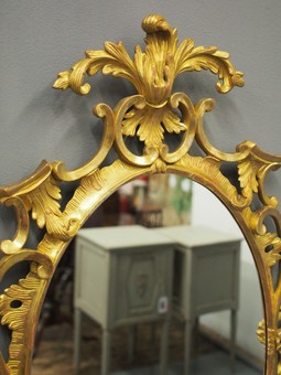 Antique Carved Wood and Gilded Oval Mirror