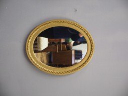 Antique Pair of Gilded Adams Style Oval Mirrors