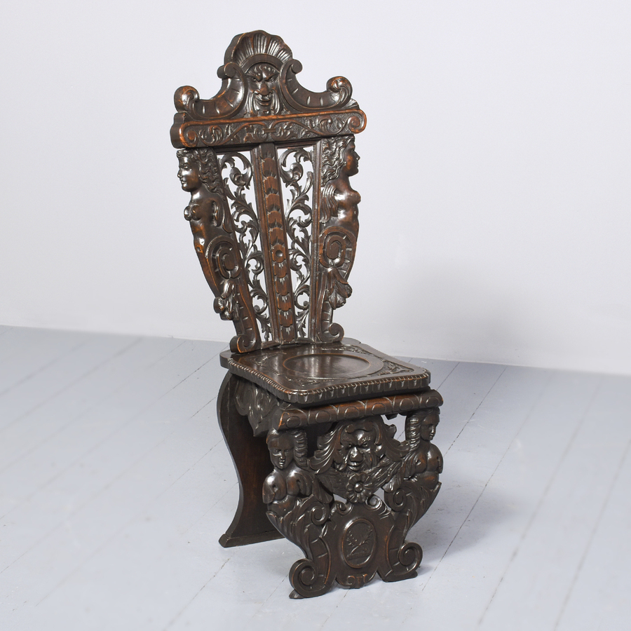 A Carved Walnut Italian Sgabello Hall Chair