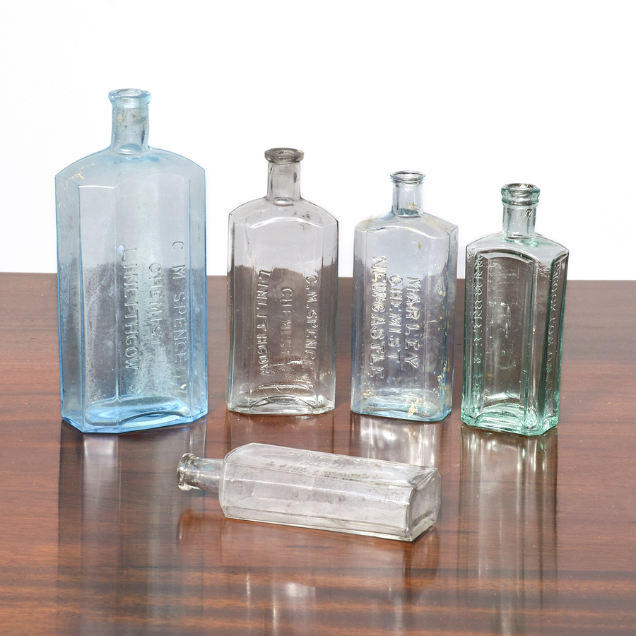 Antique 100 Edwardian medicine bottles bearing the label C.M.SPENCE CHEMIST LINLITHGOW
