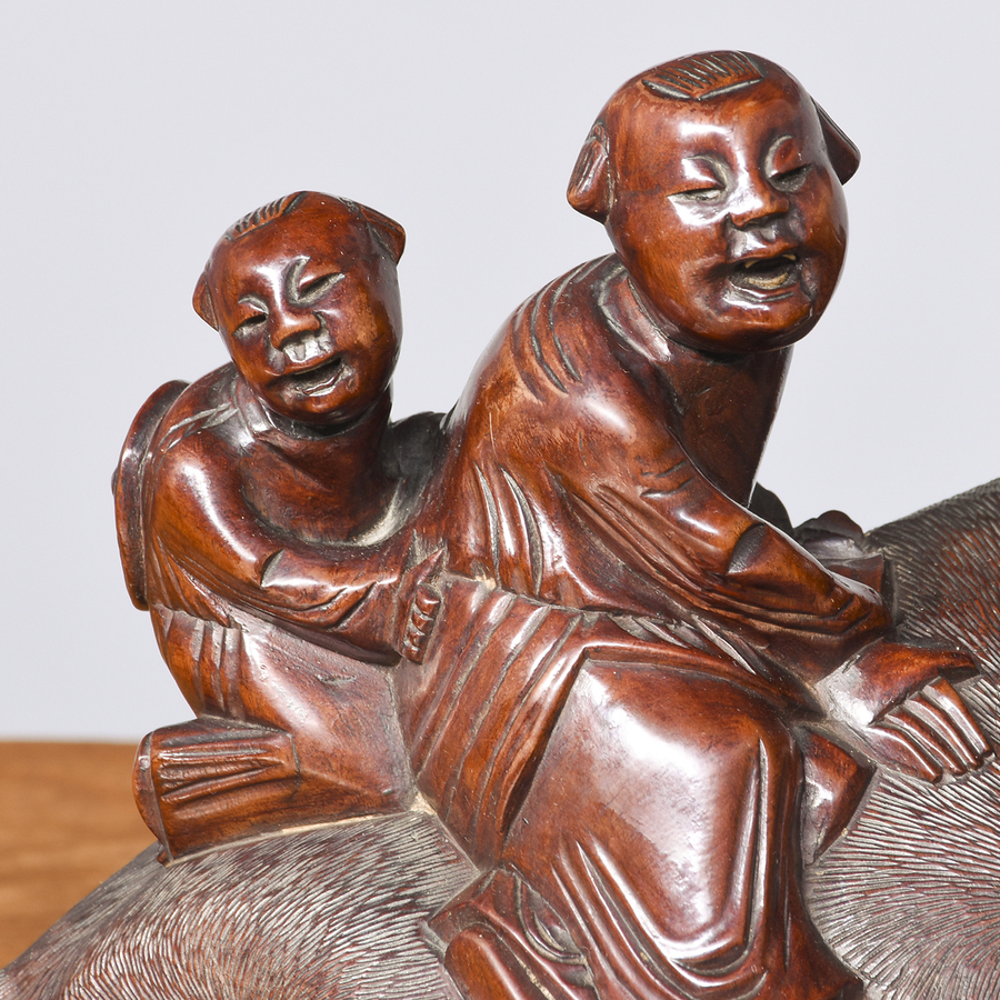 Antique Pair of Carved Hardwood Chinese Peasants Sitting on Water Buffalos