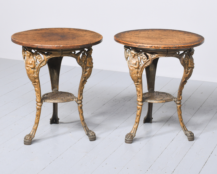 Antique Pair Of Britannia Pattern Cast Iron Pub Tables with Circular Wooden Tops
