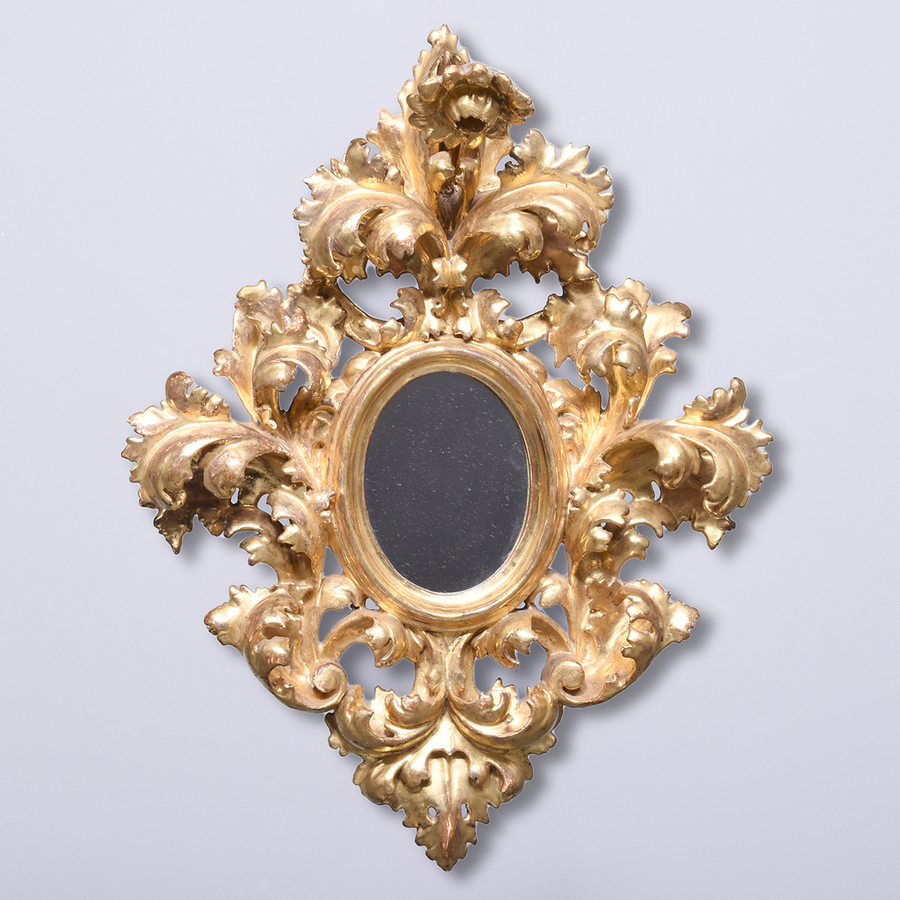 Profusely Carved and Gilded Florentine Mirror