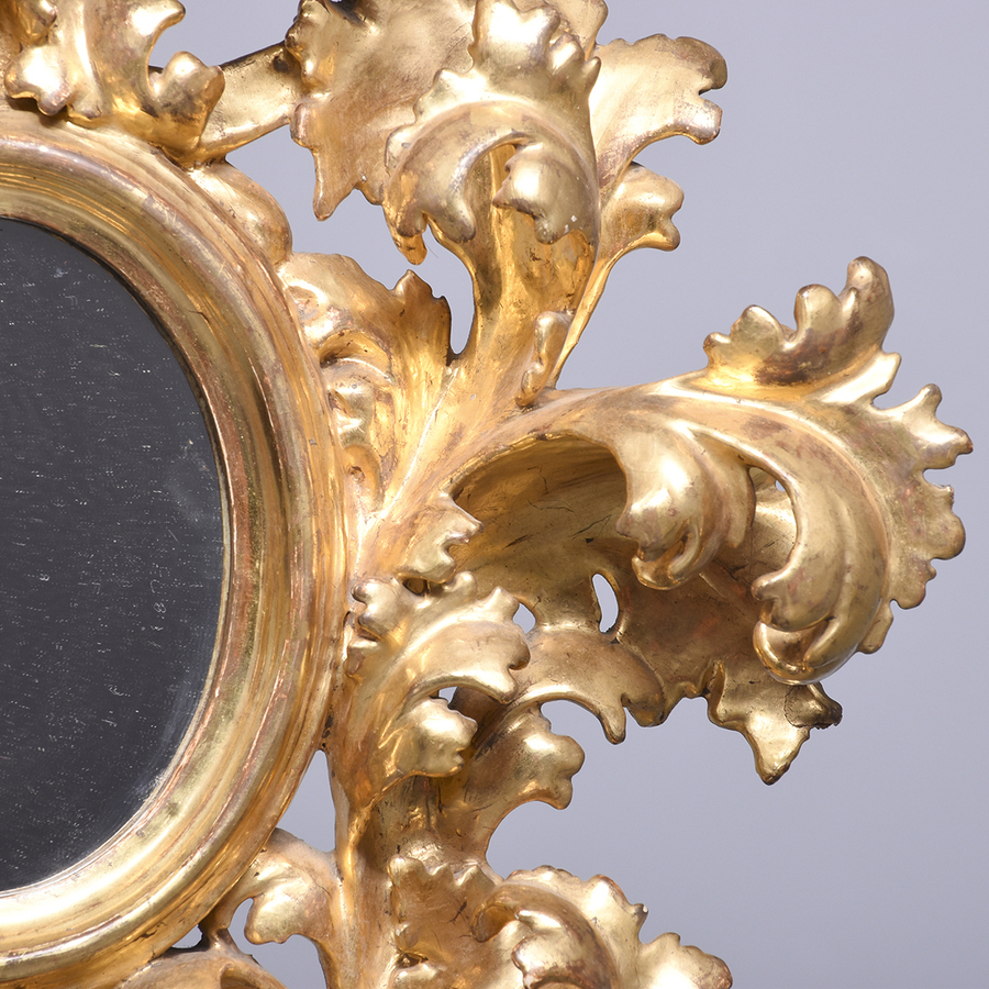 Antique Profusely Carved and Gilded Florentine Mirror