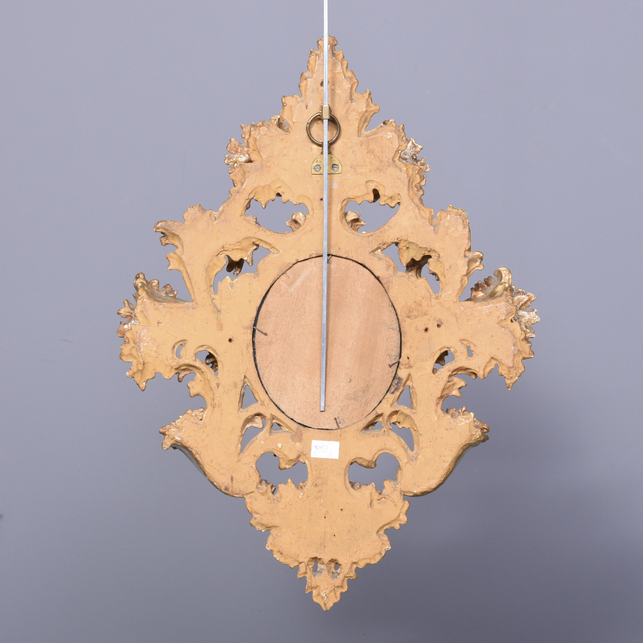 Antique Profusely Carved and Gilded Florentine Mirror