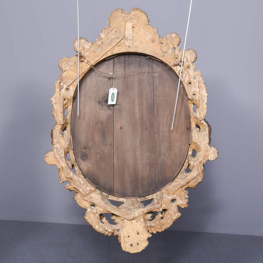 Antique Carved and Gilded Oval Wall Mirror