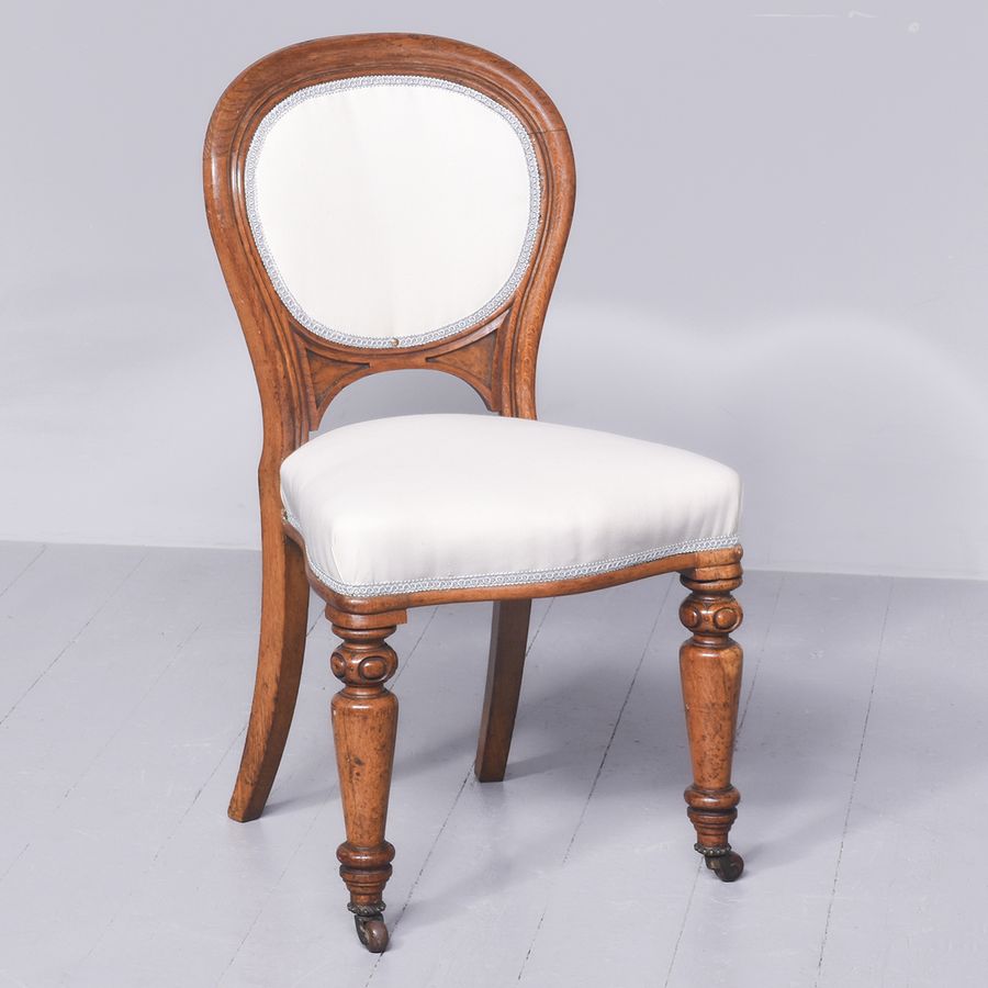 Antique Rare Set of 12 Original Victorian Oak Balloon Back Dining Chairs Including Two Carvers