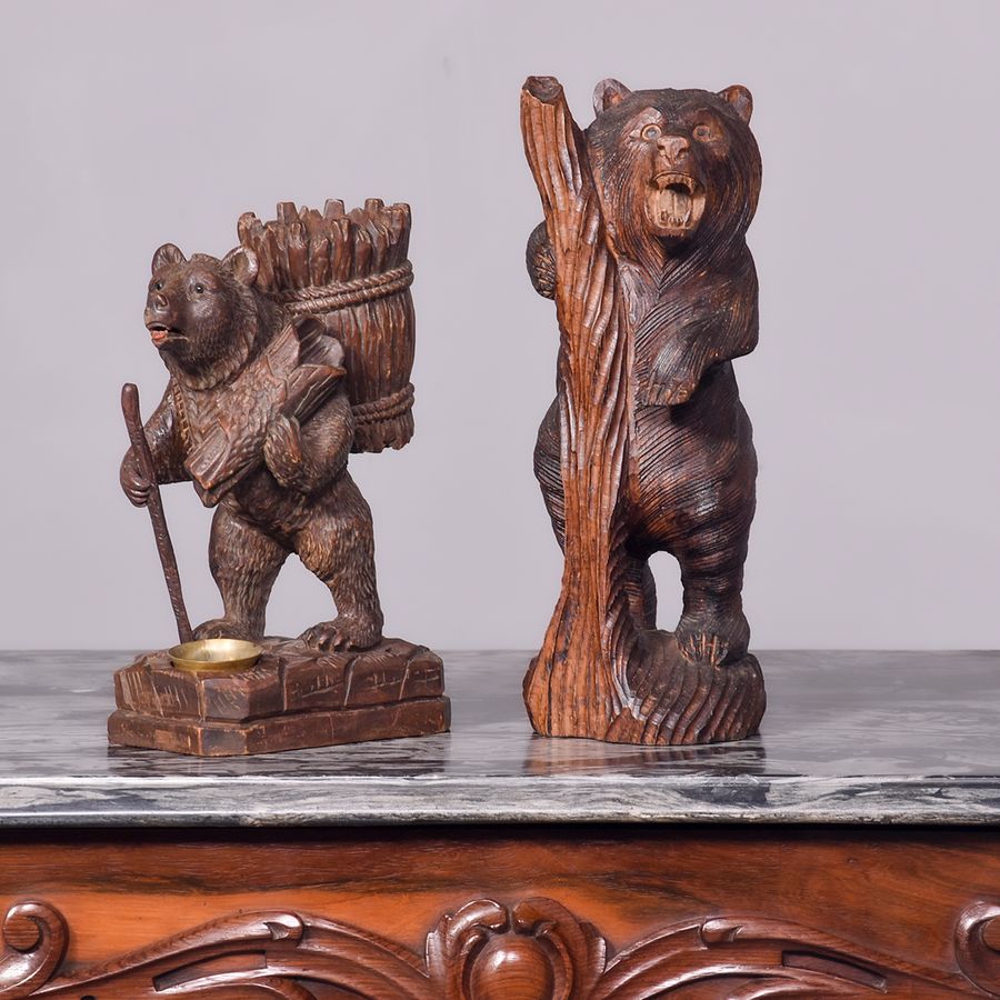 Two Carved Black Forrest figures of Bears