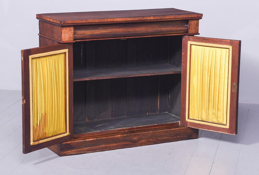 Antique Neat size rosewood Regency cabinet with brass grill doors