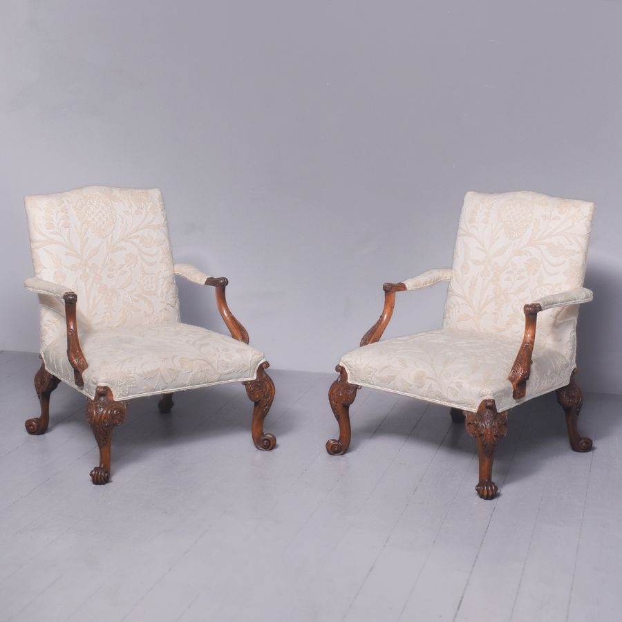 An Impressive Pair of Carved Mahogany Chippendale-Design, Gainsborough Style Armchairs