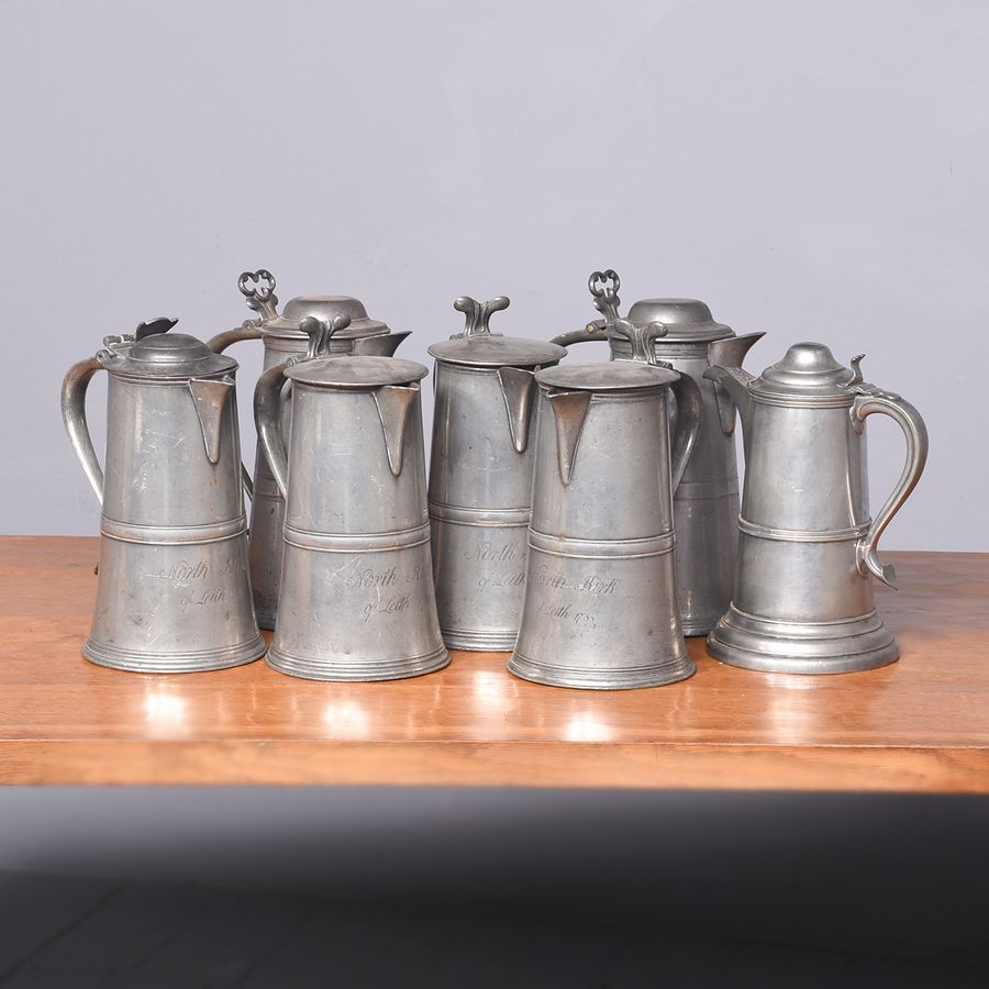 Antique Seven Large Pewter Flagons