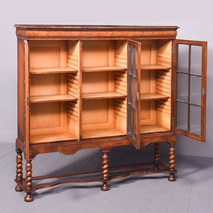 Antique Stylish George II Style Figured Walnut Three-Door Bookcase on Stand