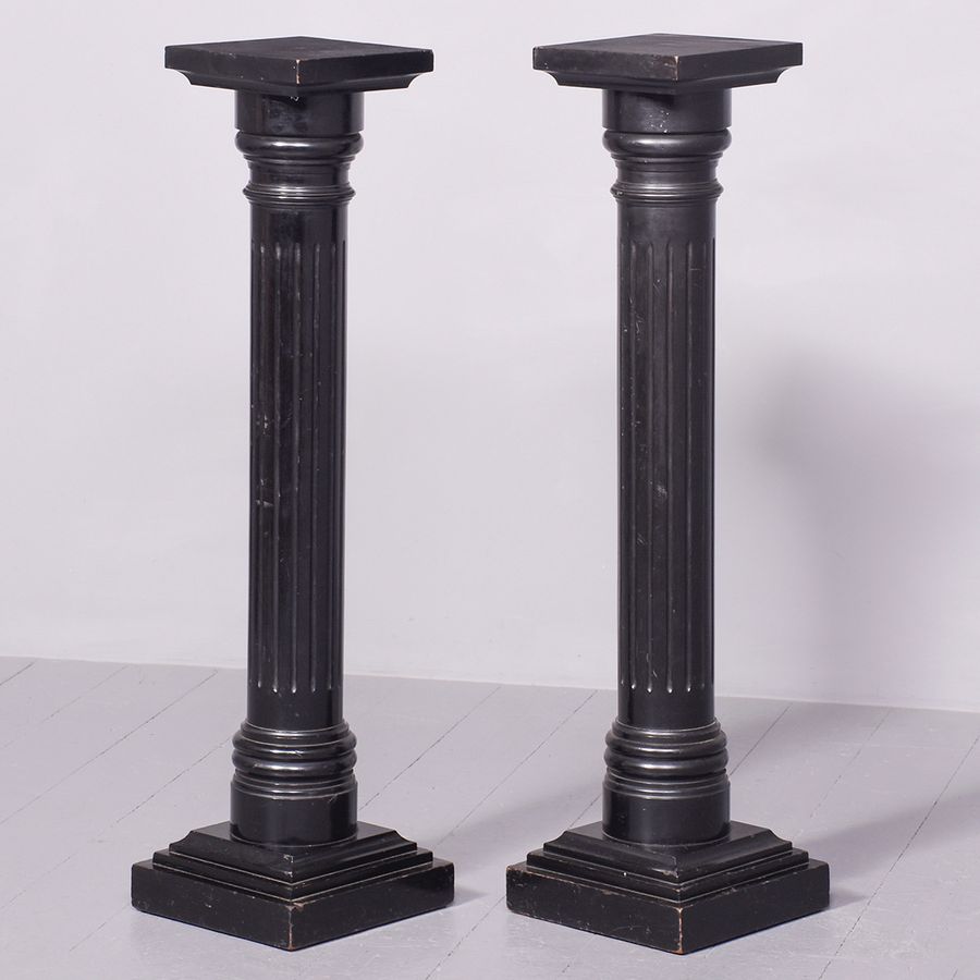 Pair of Ebonised Torcheres