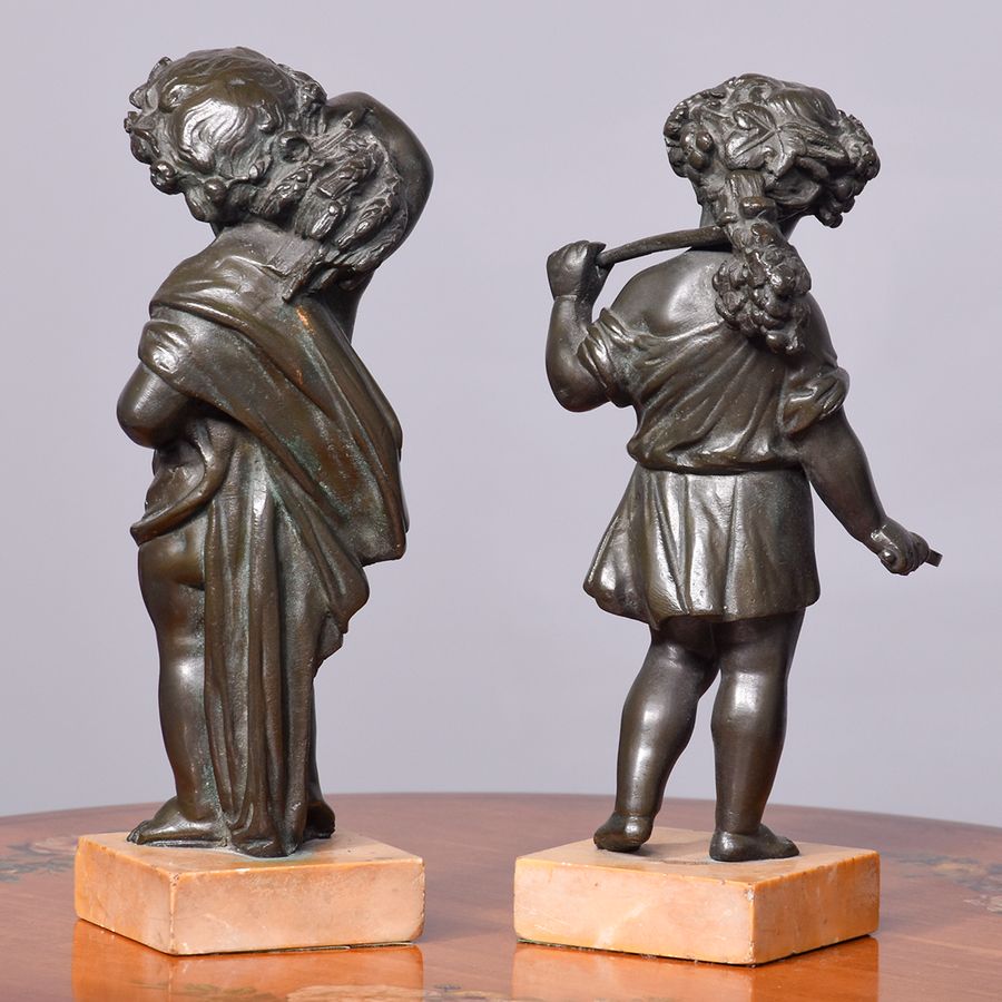 Antique A Pair of French Patinated Allegorical Bronze Figures of Putti At Harvest Time