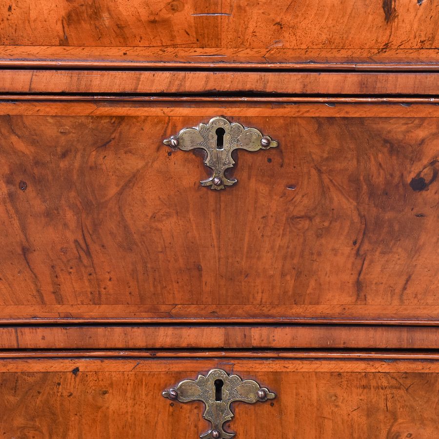 Antique Early 19th Century Dutch Crossbanded Walnut Bombe-Front Chest Of Drawers With Brushing Slide