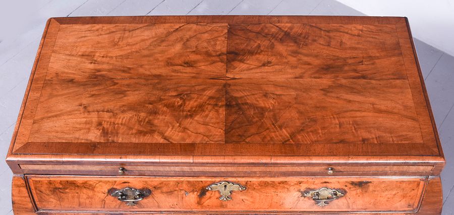 Antique Early 19th Century Dutch Crossbanded Walnut Bombe-Front Chest Of Drawers With Brushing Slide