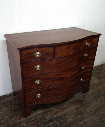George III Serpentine Inlaid Mahogany Chest of Drawers