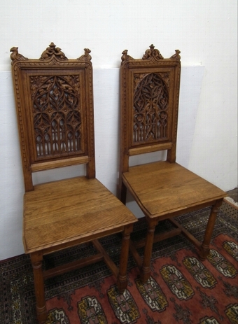 Pair of Carved Oak Hall Chairs