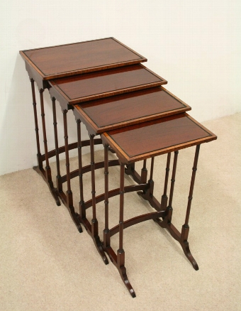 Nest of 4 Mahogany Inlaid Tables