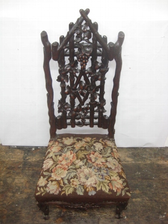 Antique Pair of Black Forest Carved Chairs