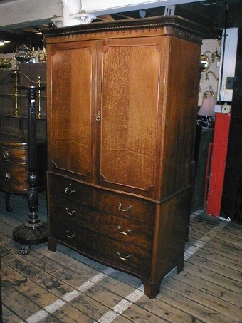 George III Style Mahogany Serpentine Linen Press