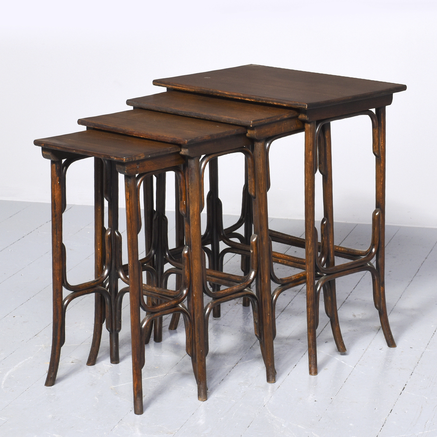 Unusual nest of 4 Bentwood Tables