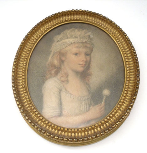 Antique Portrait of a young child holding a Rattle