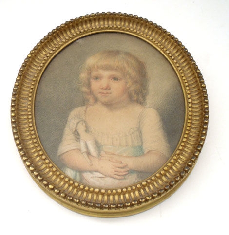 Antique Portrait of a young girl holding her doll