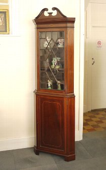 Mahogany standing display corner cupboard