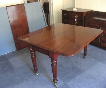 Antique Mahogany extending dining table