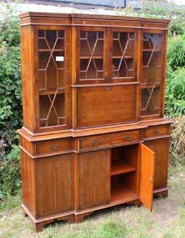 Antique Large 4 Door Breakfront Walnut Cabinet with Glazed Top Display sections.