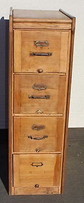 1900's Oak 4 Drawer Filing Cabinet with metal handles and label plate. No Key