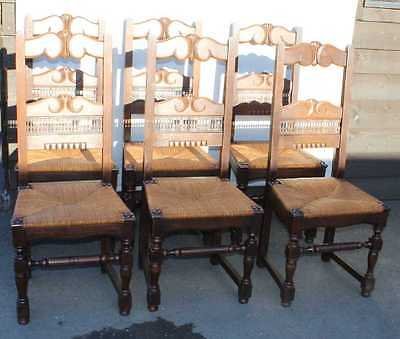 Set 6 Ladder Back Dark Oak Dining Chairs with Pop out Rush seats. 1920's