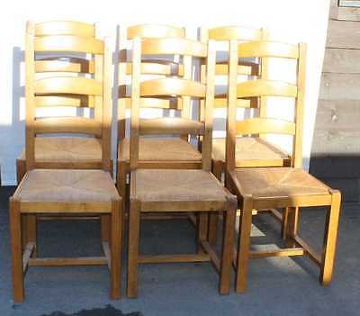 Set 6 Carved Golden Oak Dining Chairs with Rush seats. 1930's