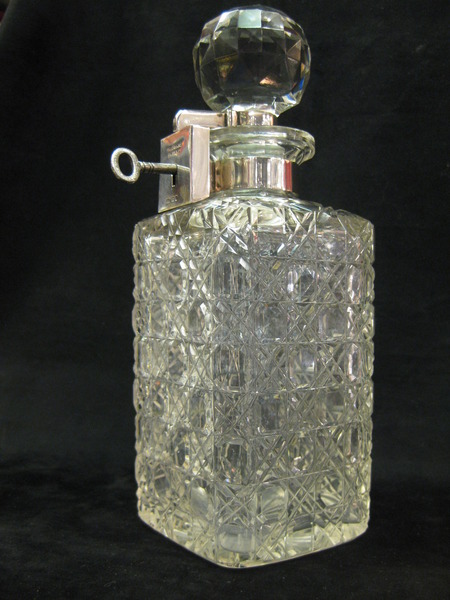 Silver topped lockable decanter 