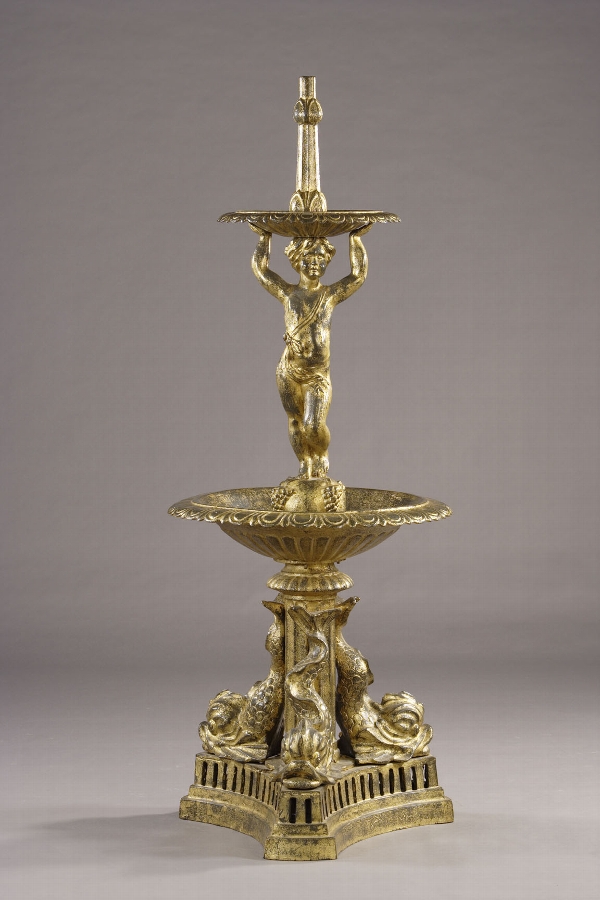 A  two basins gilt cast-iron fountain