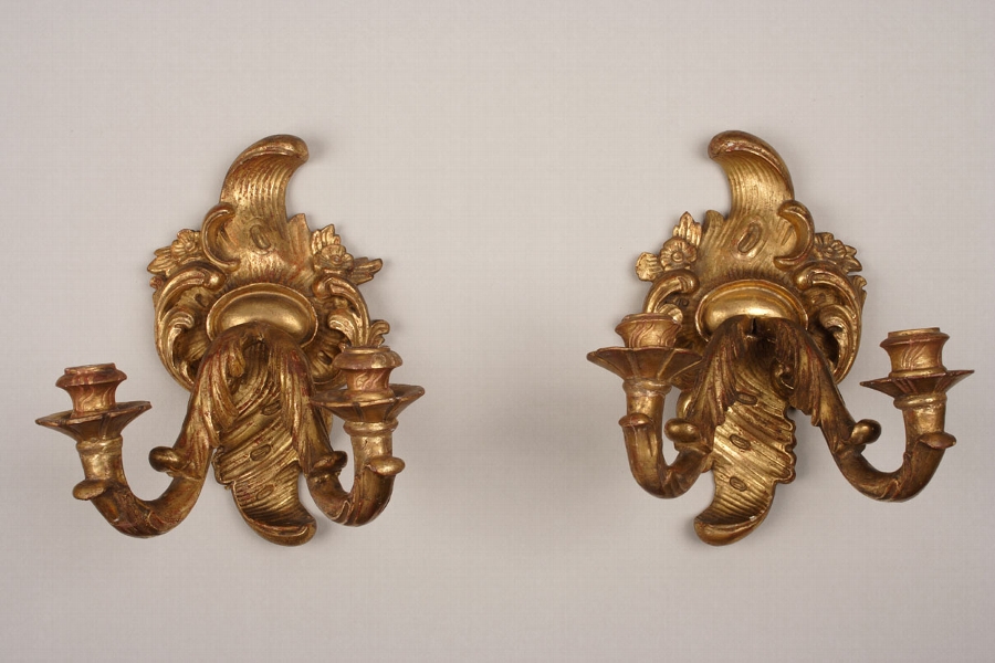 Two " rocaille" sconces in giltwood