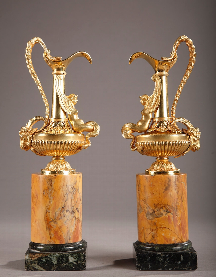 Pair of bronze ewers