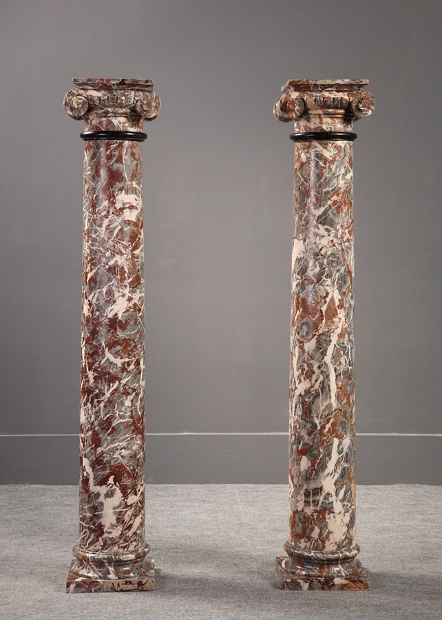 Pair of 19th Century rouge royal marble columns