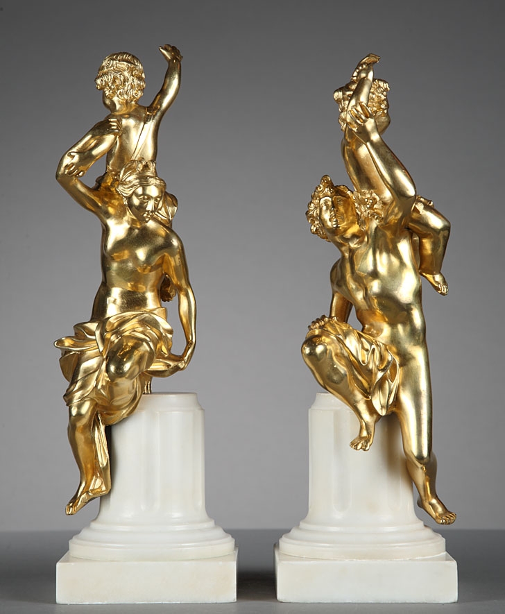 Two French Second Empire chiseled and gilt bronze groups on a white marble base after Corneille Van Cleve