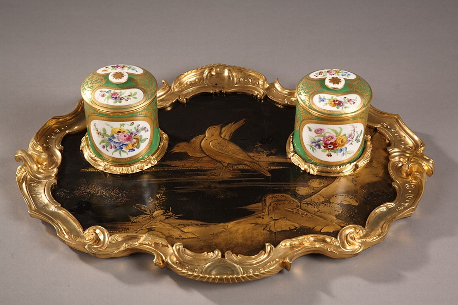A Louis XV style lacquered inkstand with S?vres porcelain