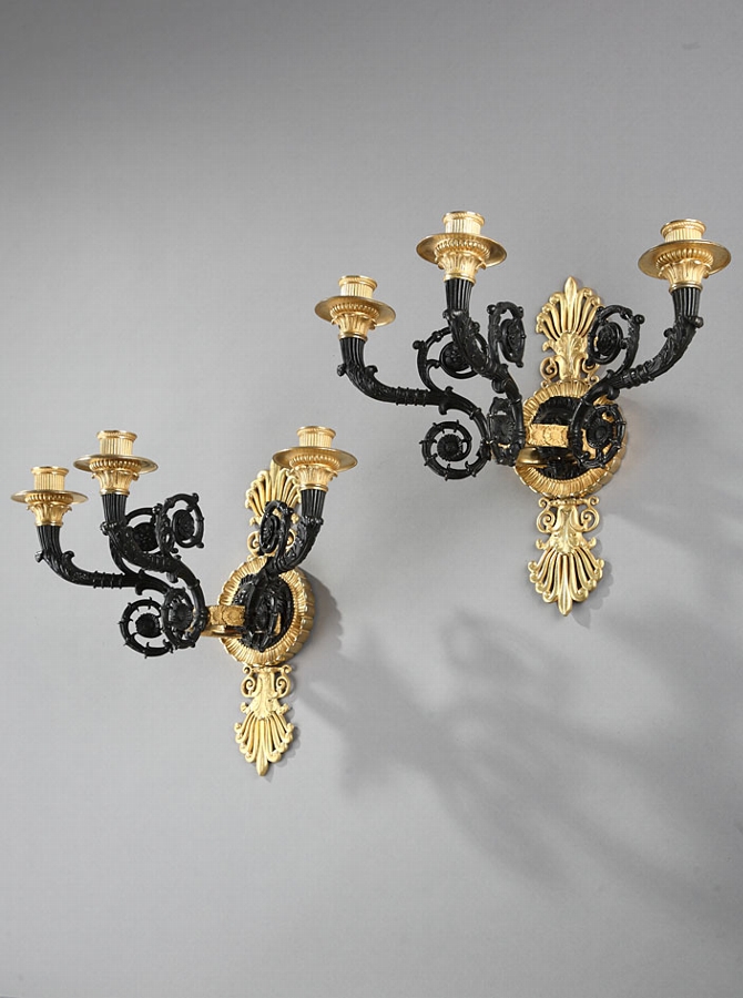 Pair of early 19th Century French gilt bronze sconces with lion's muzzles