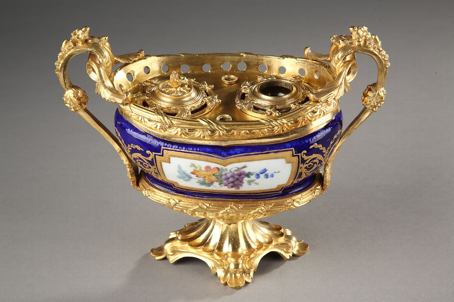 Inkstand in 18th century Sevres porcelain and later Louis XV style gilded bronze mounts