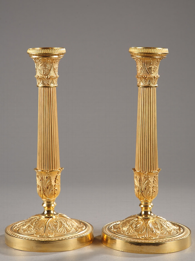 Pair of early 19th century French Empire ormolu candlesticks