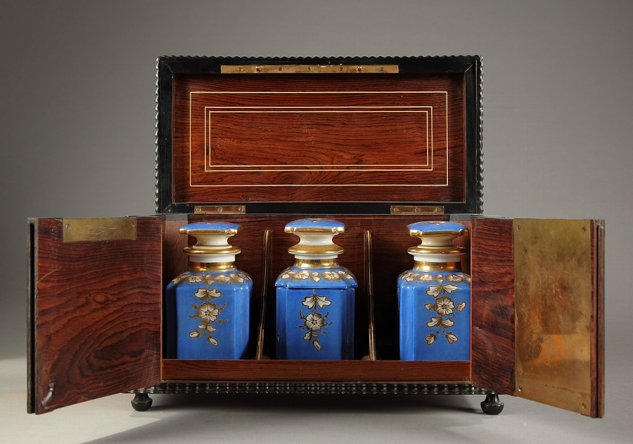 Three porcelain bottles in a Napoleon III wooden box