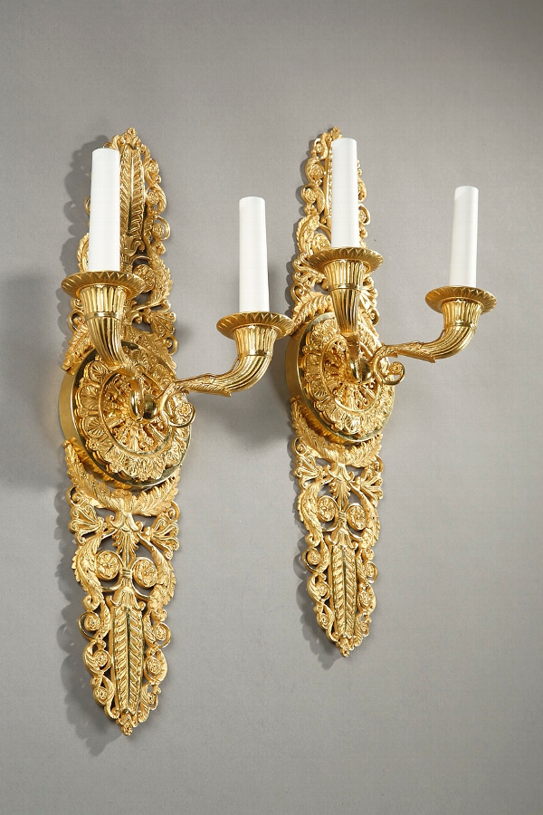 Large pair of French Charles X ormolu two light sconces