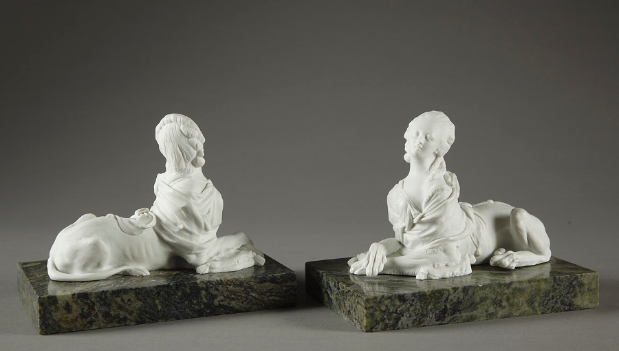 Two sculptures in porcelain biscuit of the eighteenth century representing Madame de Pompadour in sphinx