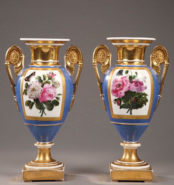 A pair of gilt and polychrome 19th Century Paris porcelain vases with Flomers and Birds
